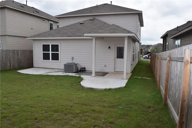 a front view of house with yard