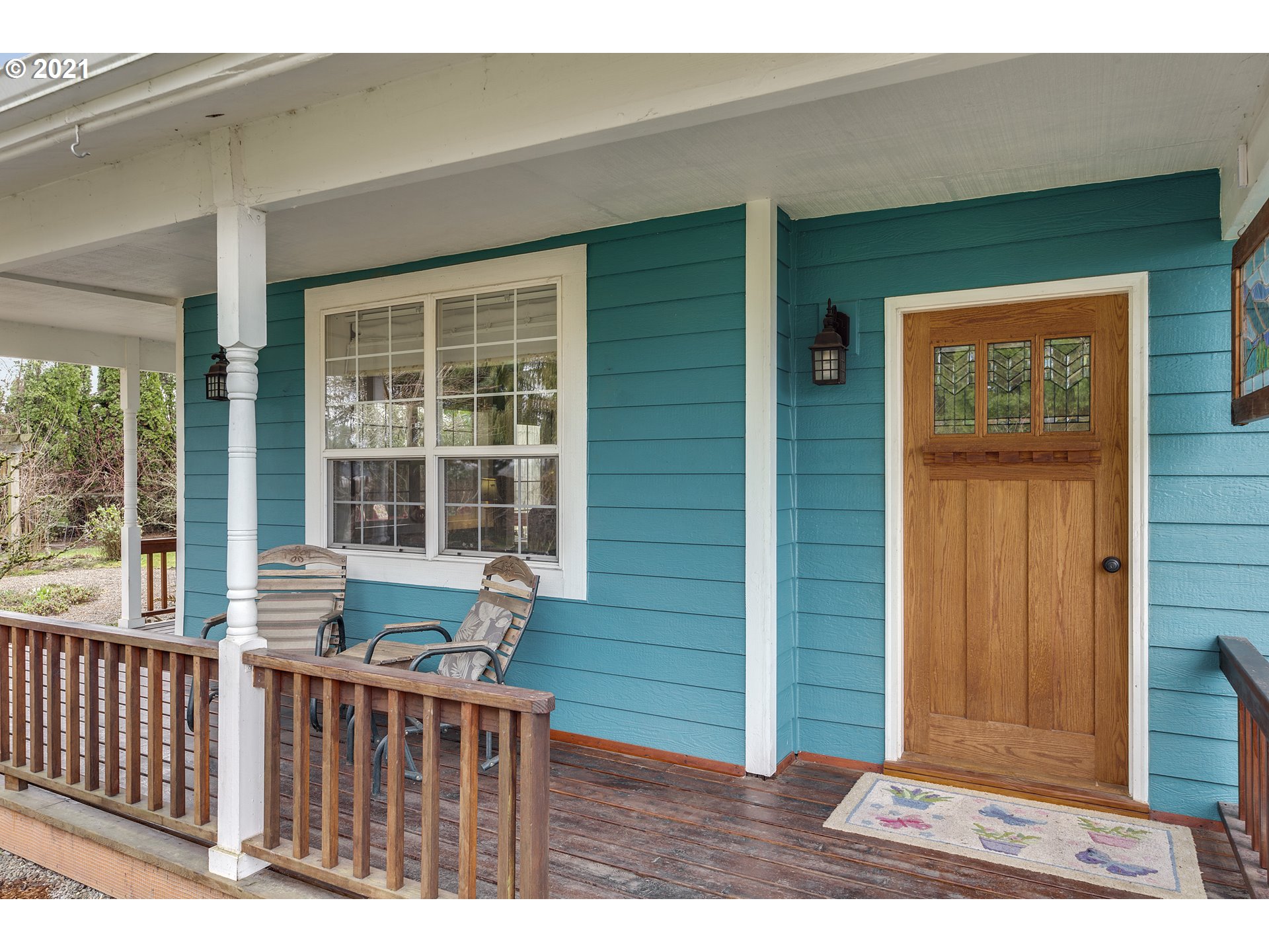 7150 South Barnards Road Canby, OR 97013 - Photo 3 of 32 a front view of a house with a porch