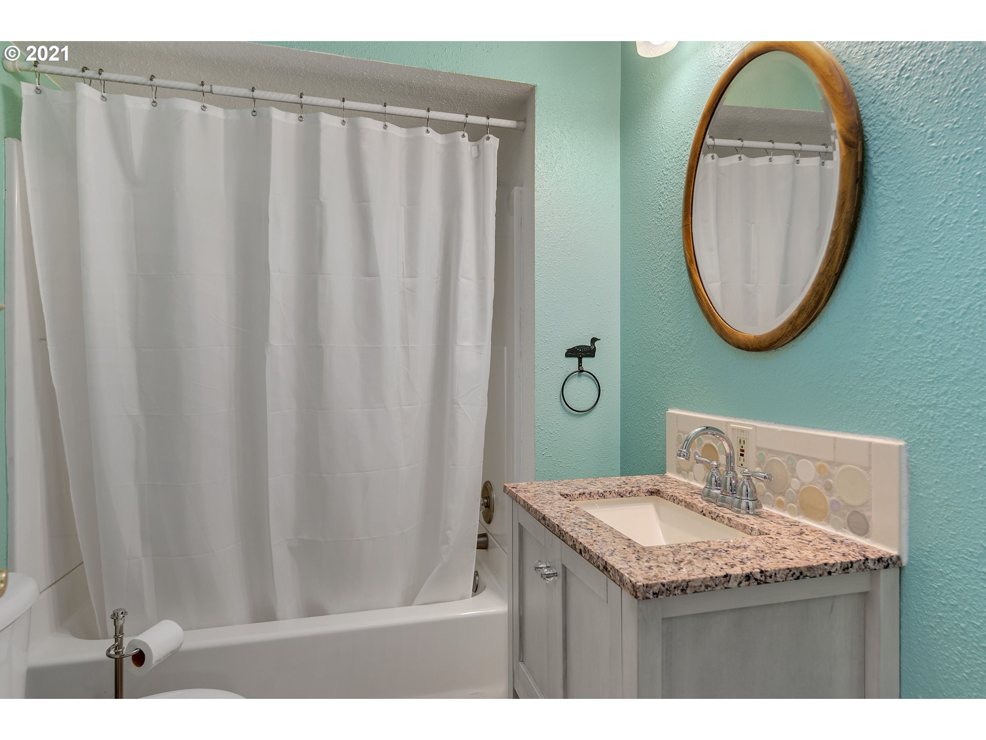 7150 South Barnards Road Canby, OR 97013 - Photo 6 of 32 a bathroom with a granite countertop sink and a mirror