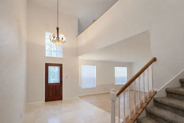 a view of a hallway with front door