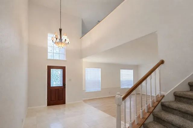 a view of a hallway with front door