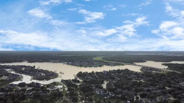 a view of a lake with a city