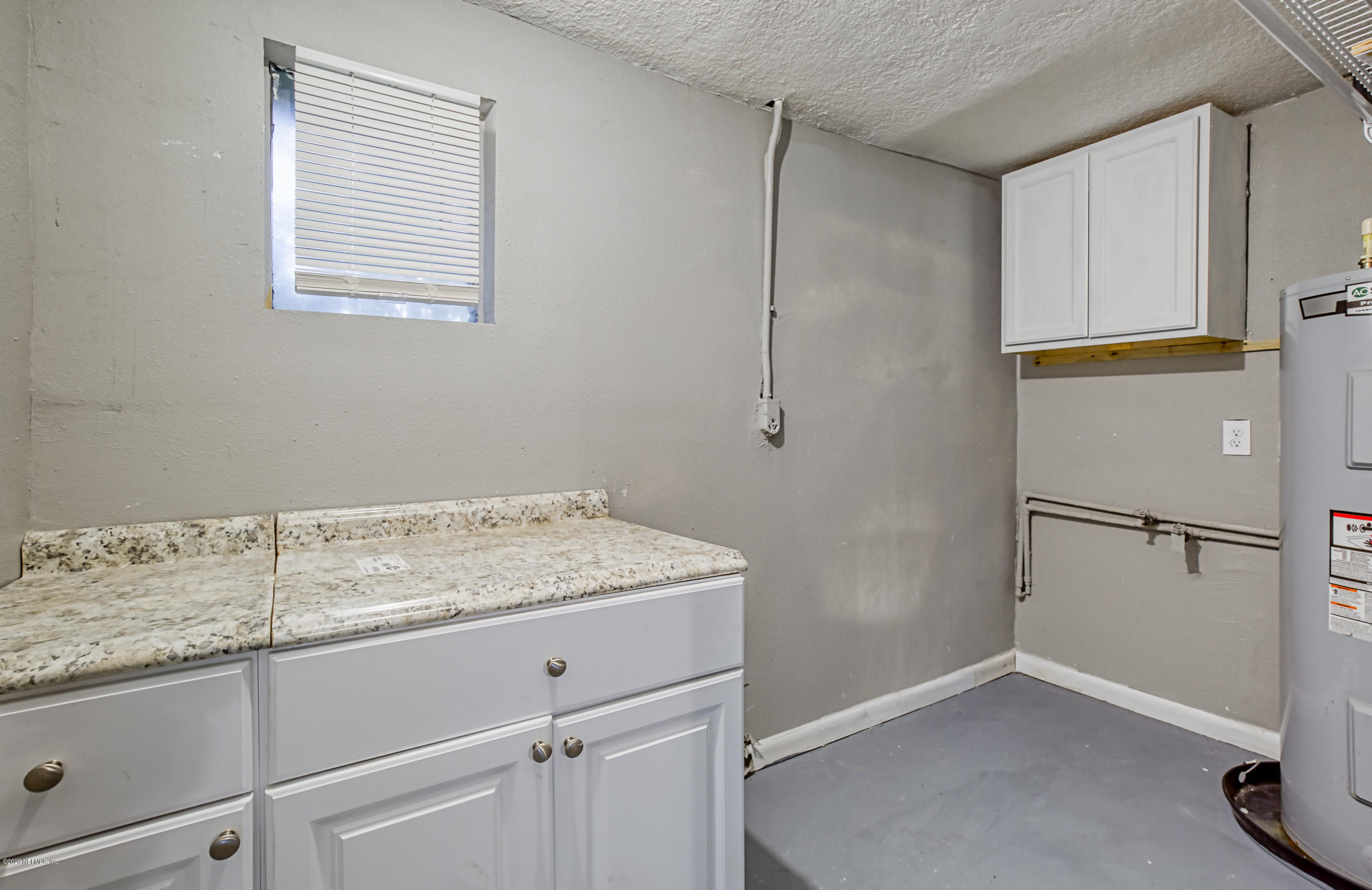 5176 Moncrief Road West Jacksonville, FL 32209 - Photo 18 of 22 Laundry Room