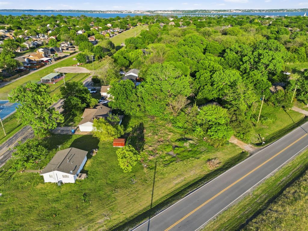 2514 Chiesa Road Rowlett, TX 75088 - Photo 16 of 19 a view of a yard with potted plants