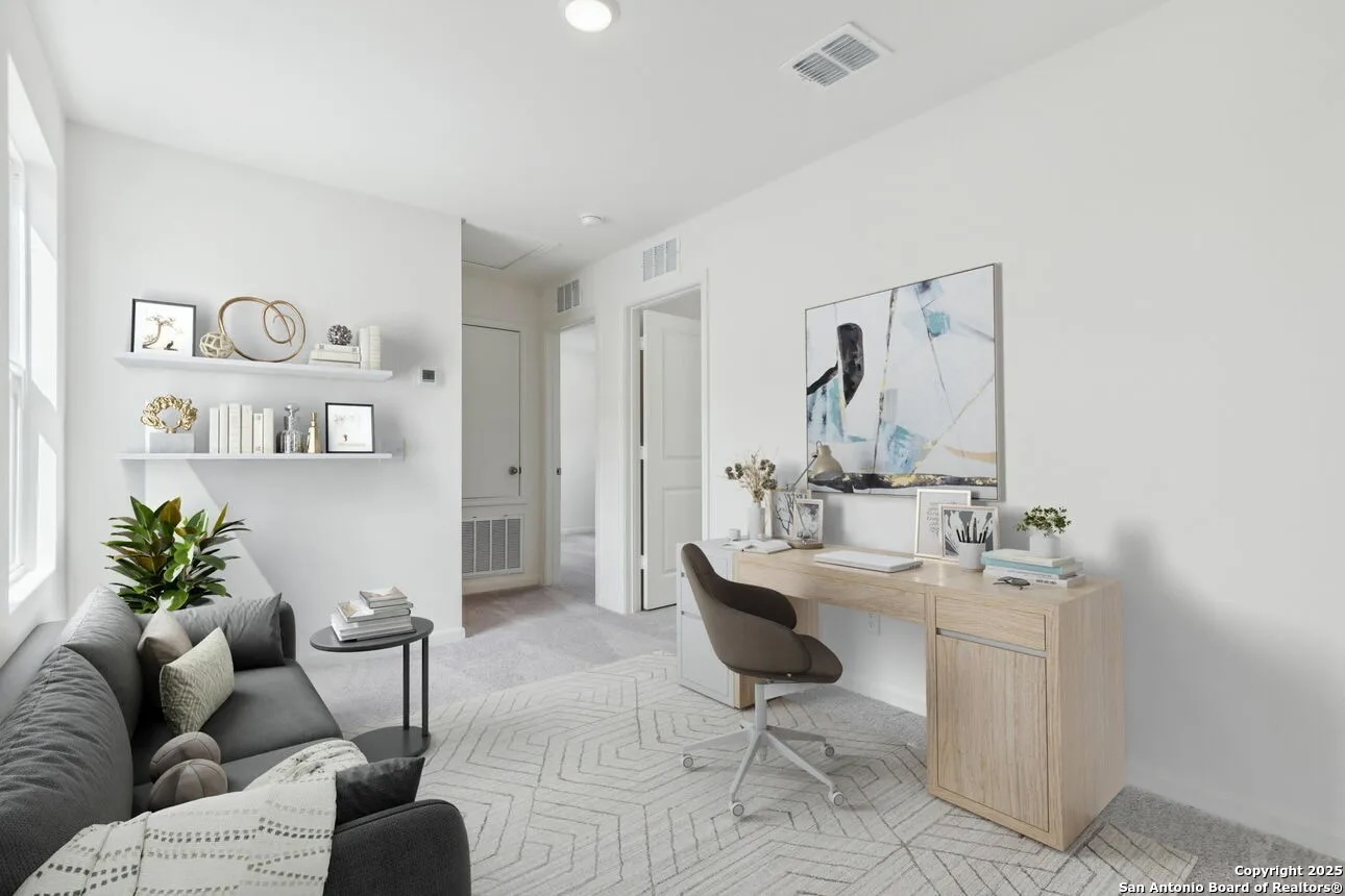 815 Dark Lark Adkins, TX 78101 - Photo 6 of 11 a living room with furniture and a table