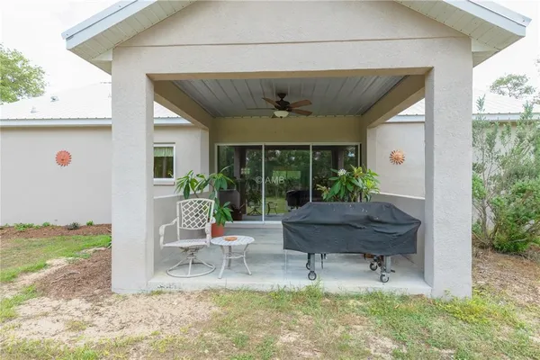 a house view with a outdoor seating space