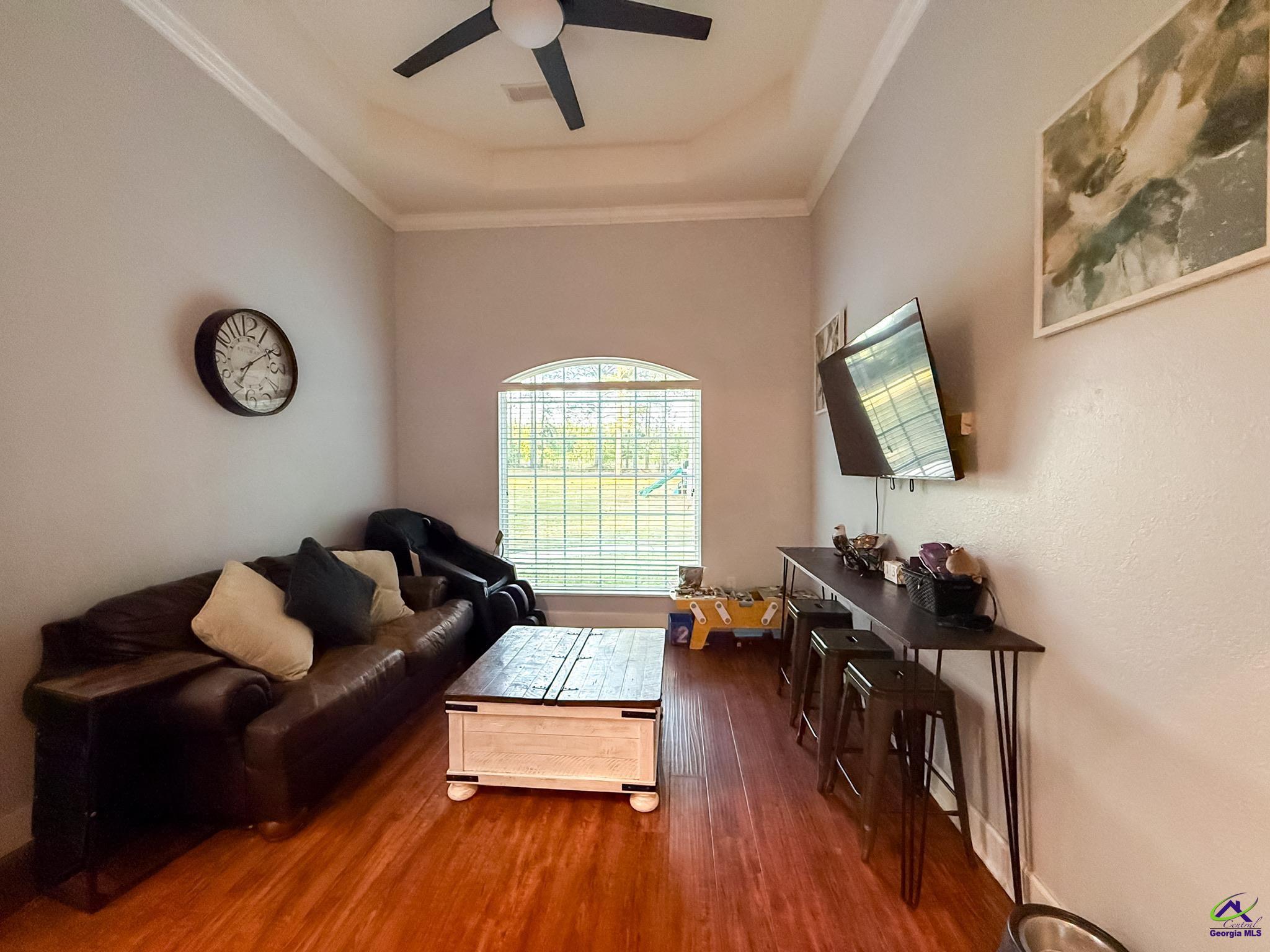 1060 Edna Moore Road Eastman, GA 31023 - Photo 23 of 87 a living room with furniture and wooden floor