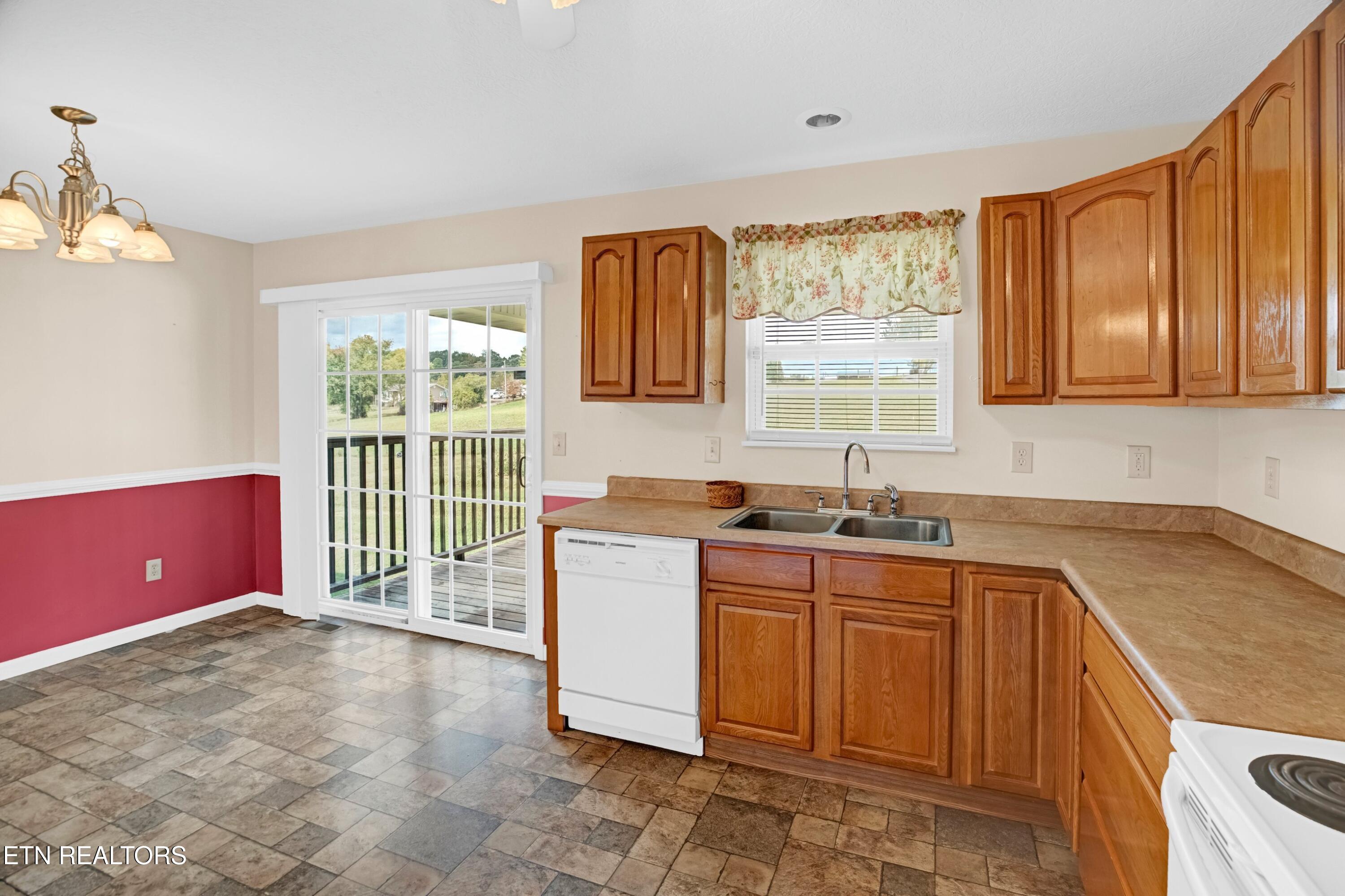2008 Bessie Slaton Road Dandridge, TN 37725 - Photo 12 of 51 ACCESS BACK DECK FROM KIT/DINING AREA