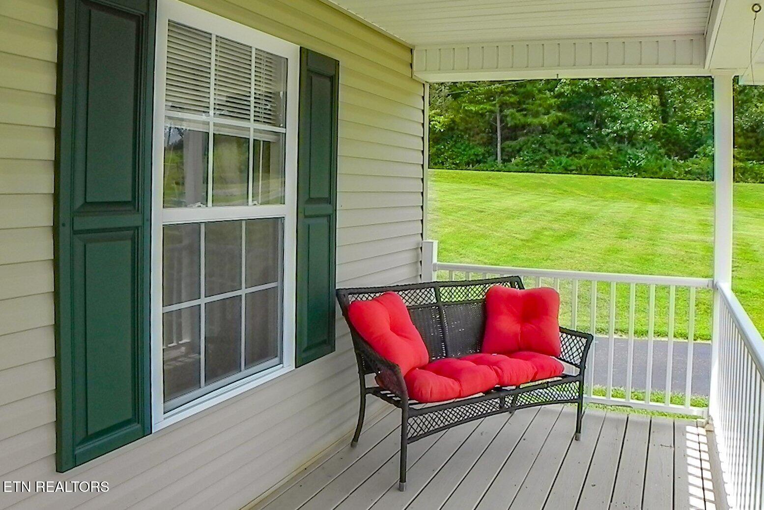 2008 Bessie Slaton Road Dandridge, TN 37725 - Photo 40 of 51 FRONT PORCH AND SIDE YARD