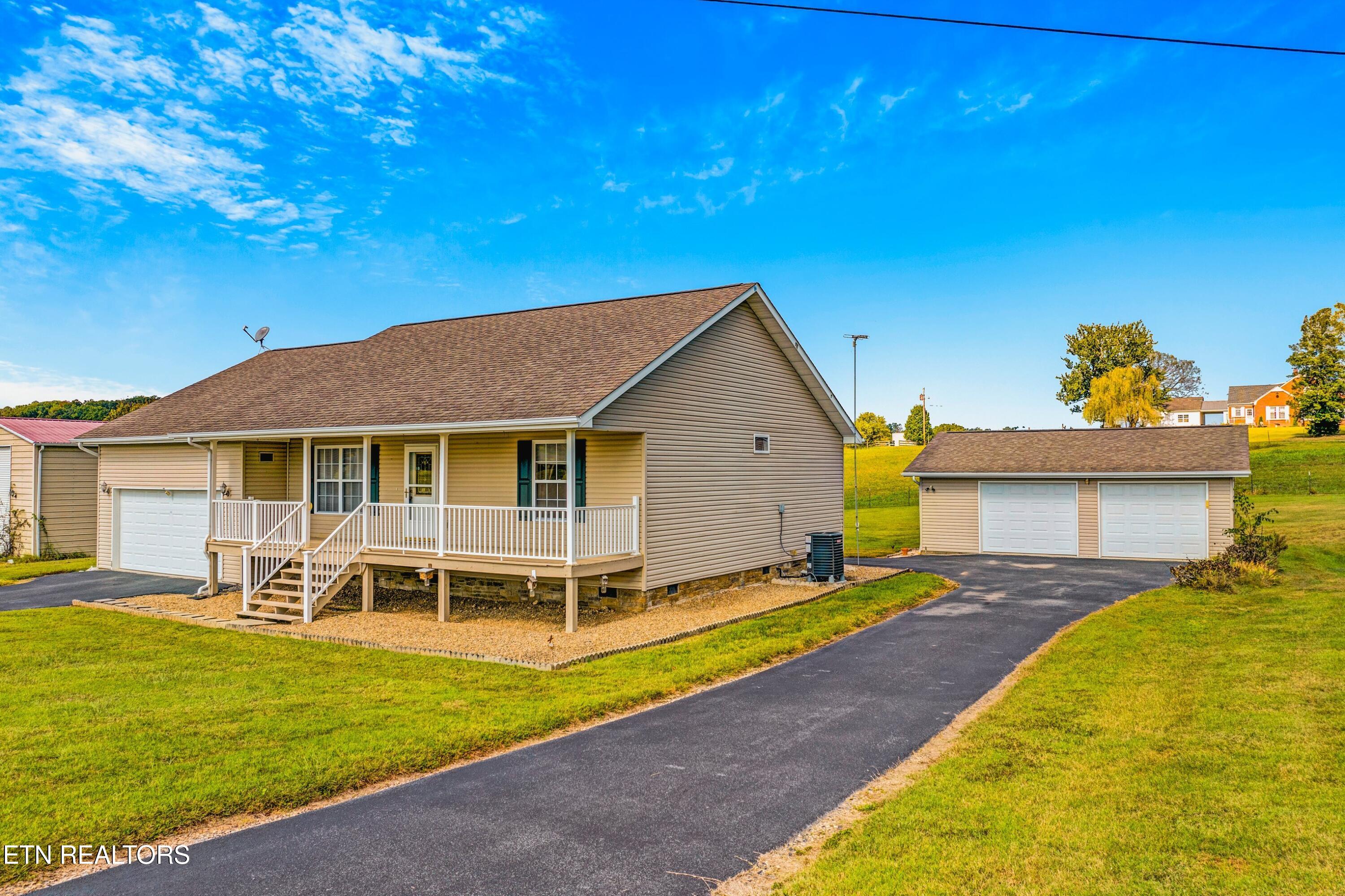 2008 Bessie Slaton Road Dandridge, TN 37725 - Photo 4 of 51 DETACHED GARAGE W/ SEPERATE DRIVEWAY