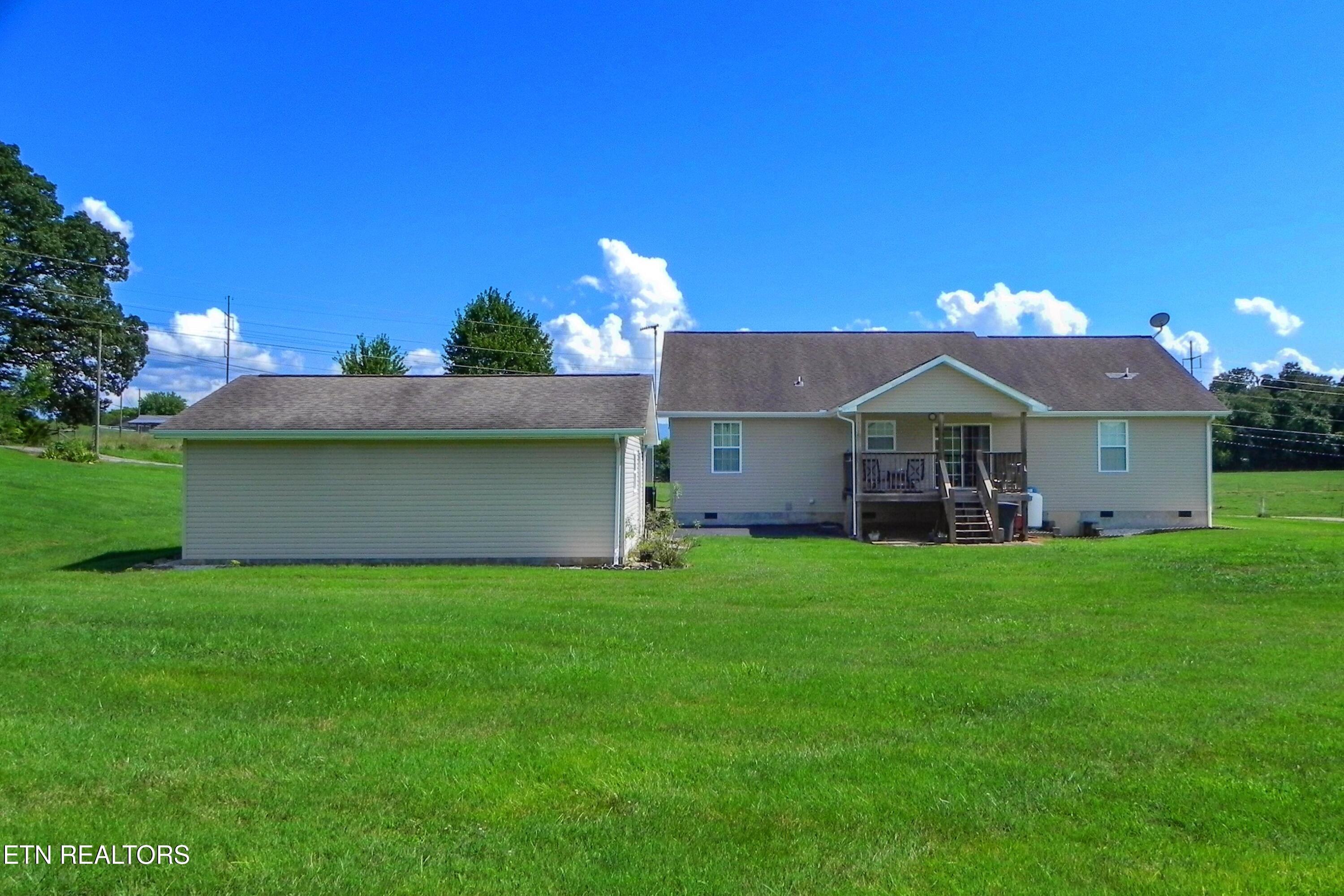 2008 Bessie Slaton Road Dandridge, TN 37725 - Photo 47 of 51 BACK VIEW OF HOME & GARAGE