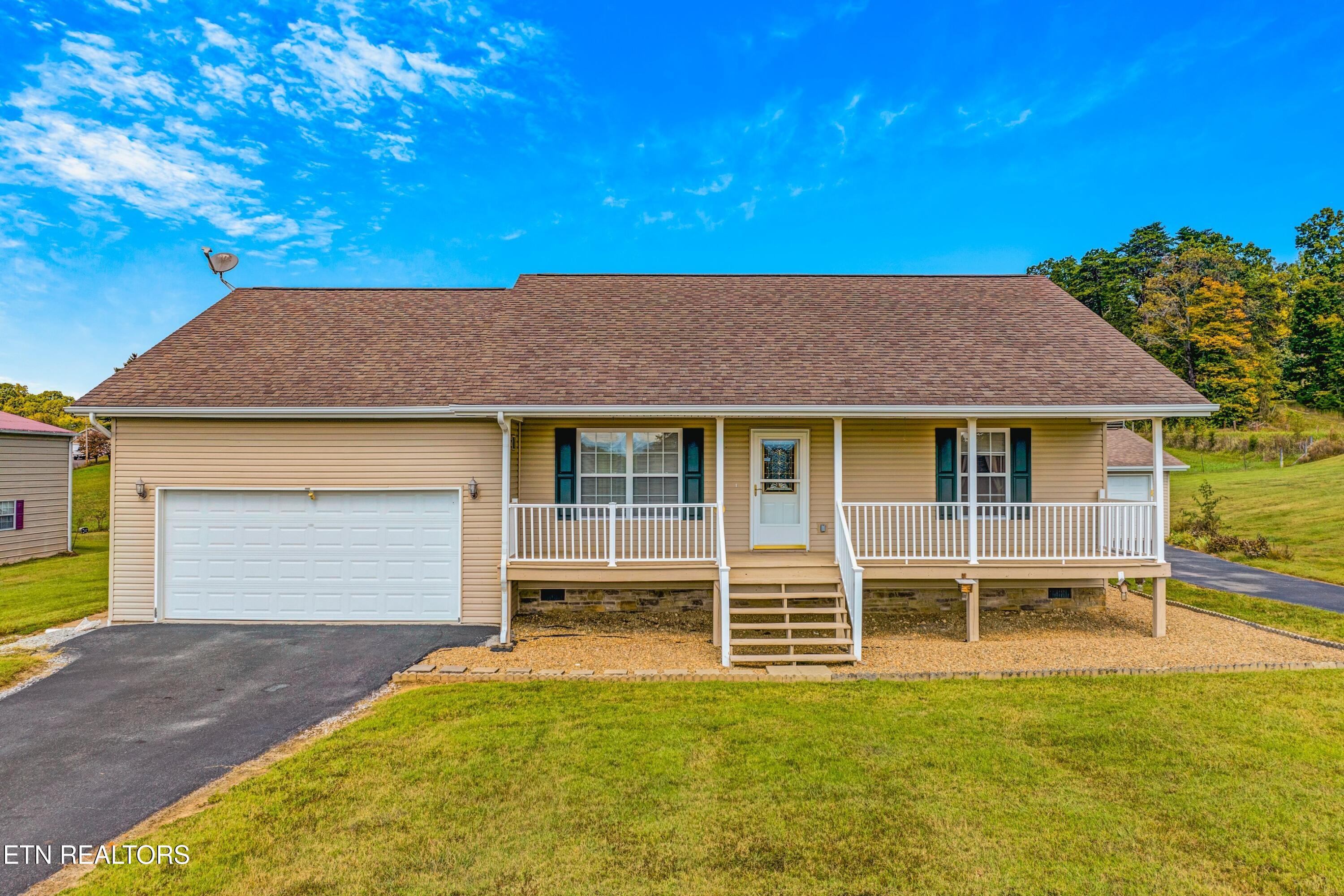 2008 Bessie Slaton Road Dandridge, TN 37725 - Photo 5 of 51 LARGE FRONT PORCH