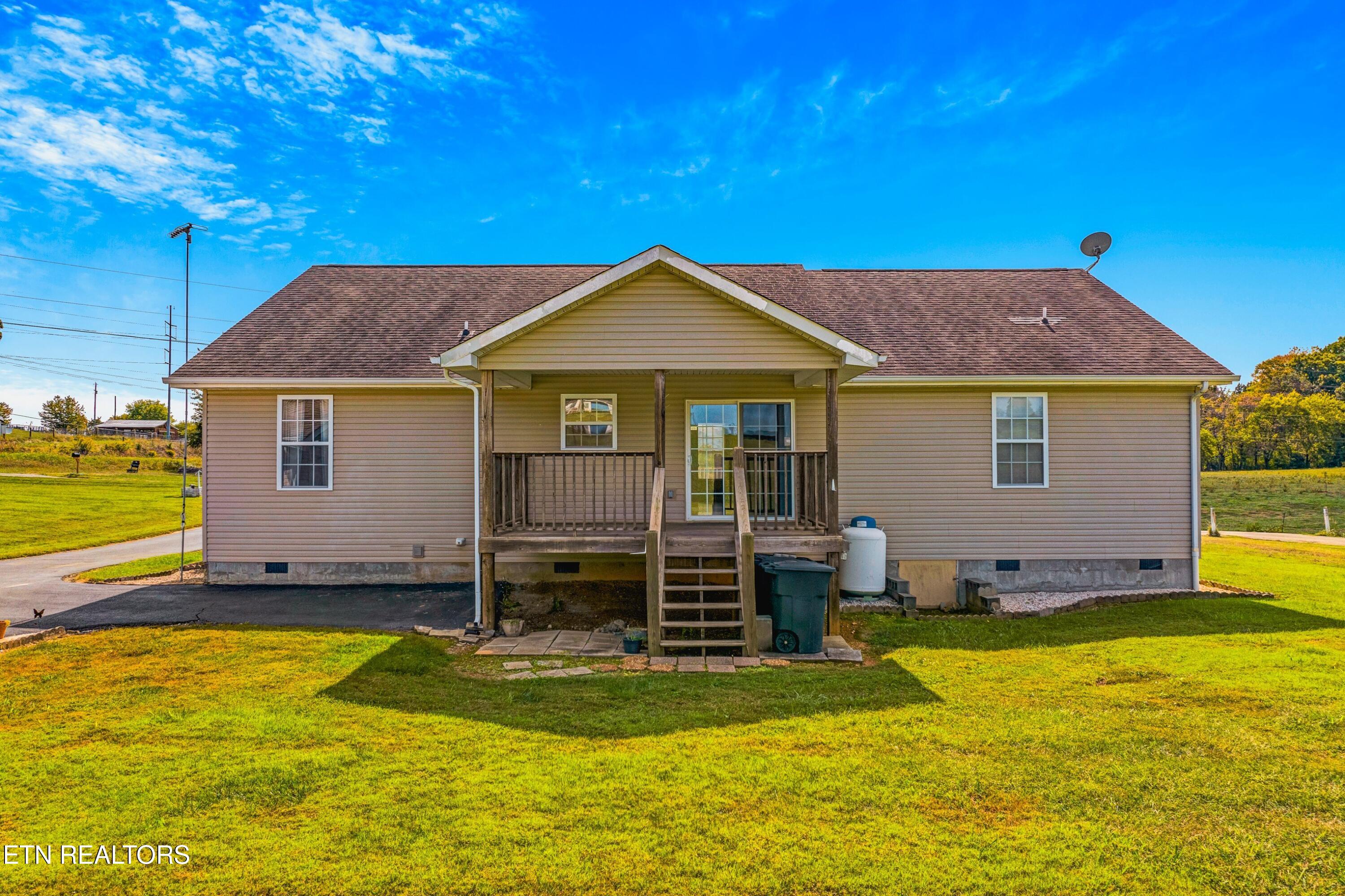 2008 Bessie Slaton Road Dandridge, TN 37725 - Photo 6 of 51 COVERED BACK DECK W/ ACCESS TO BACK YARD