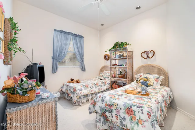 a bathroom with a sink vanity mirror and toilet