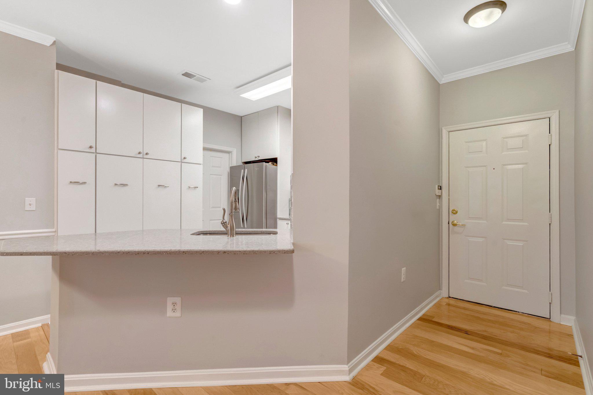 4310 Cannon Ridge Court, Unit 75 Fairfax, VA 22033 - Photo 8 of 29 Modern entryway with sleek finishes.