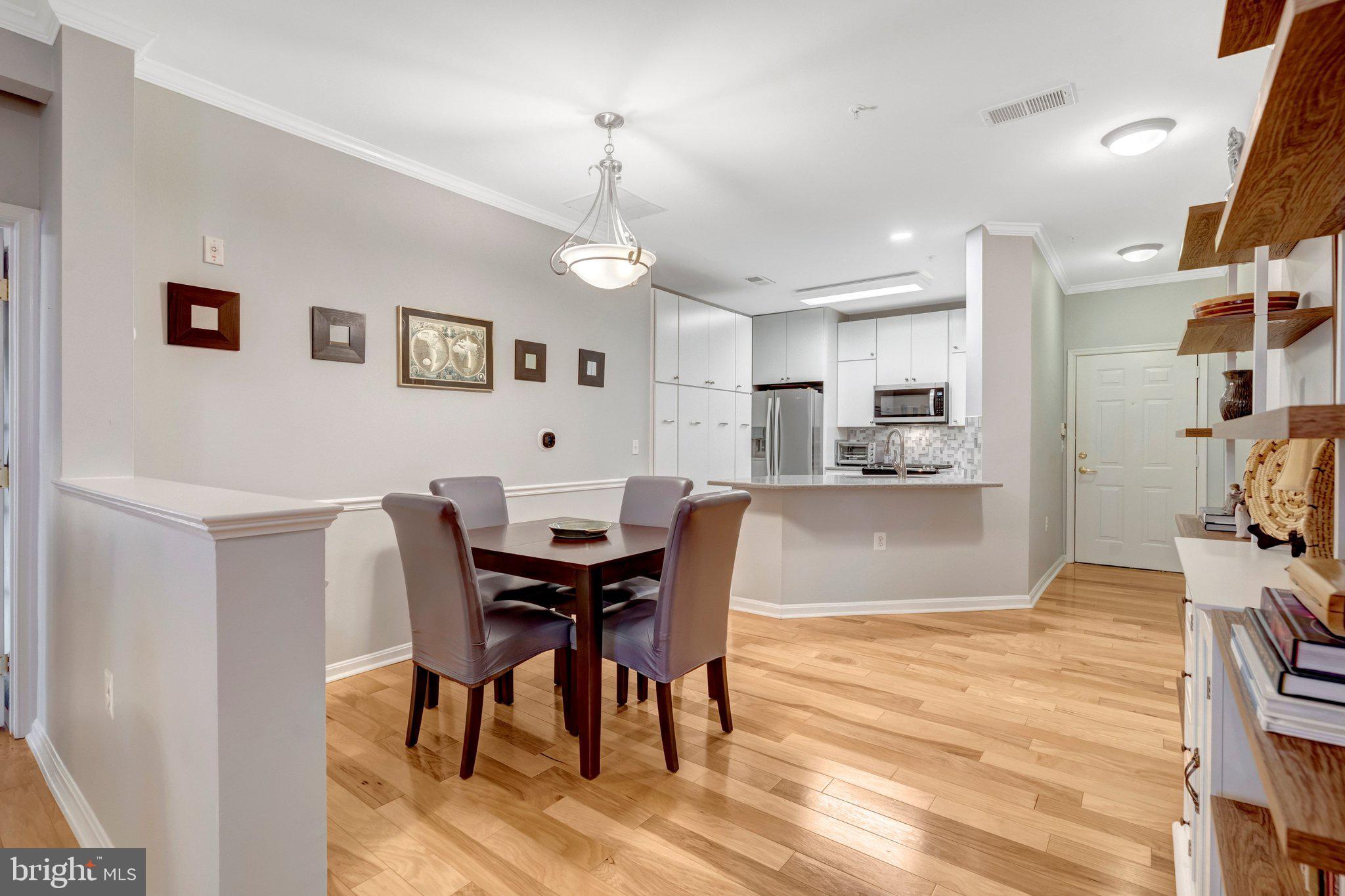 4310 Cannon Ridge Court, Unit 75 Fairfax, VA 22033 - Photo 10 of 29 Modern elegance in a cozy dining space.