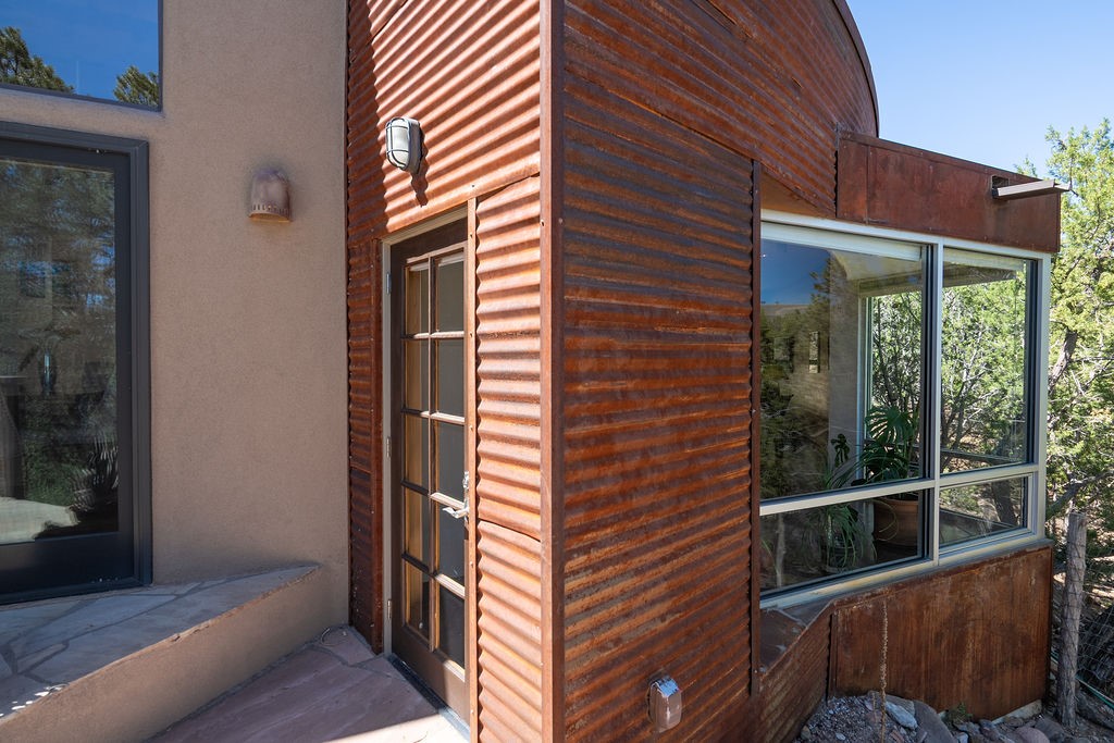111 The High Road Santa Fe, NM 87507 - Photo 13 of 37 Library/media room bespoke window exterior