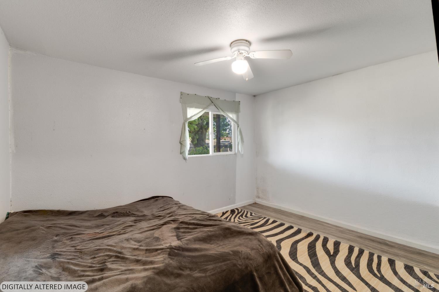 1722 Indiana Street Fairfield, CA 94533 - Photo 13 of 18 a bedroom with bed and a window