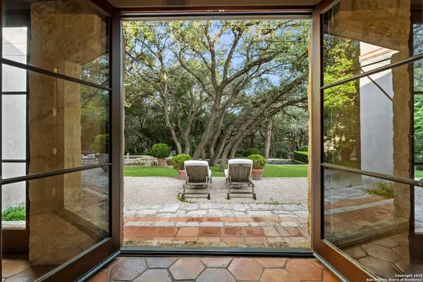a view of a porch with furniture