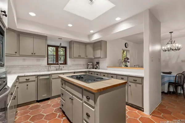 a view of yard with swimming pool and green space