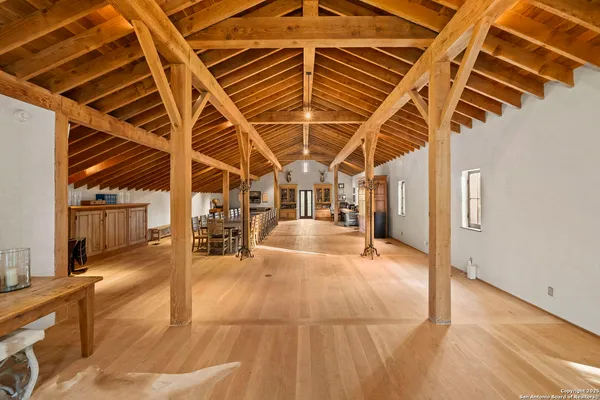 a front view of a house with a yard and a garage