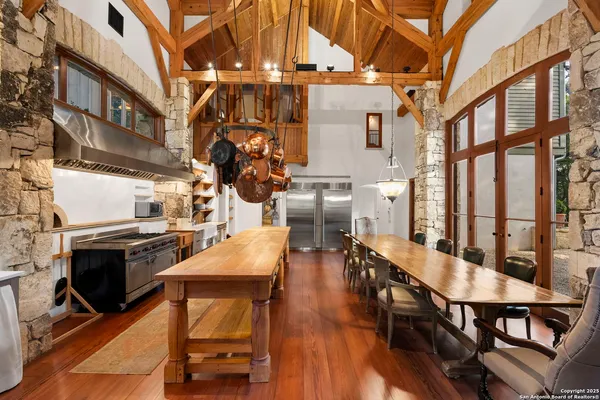 a view of a chairs and table in a patio