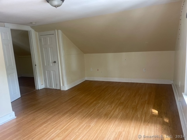 24 Arthur Street New Haven, CT 06519 - Photo 10 of 14 a view of empty room with wooden floor