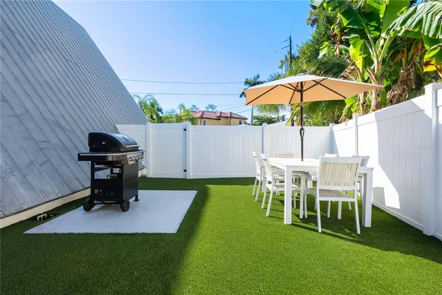 a view of swimming pool with a yard