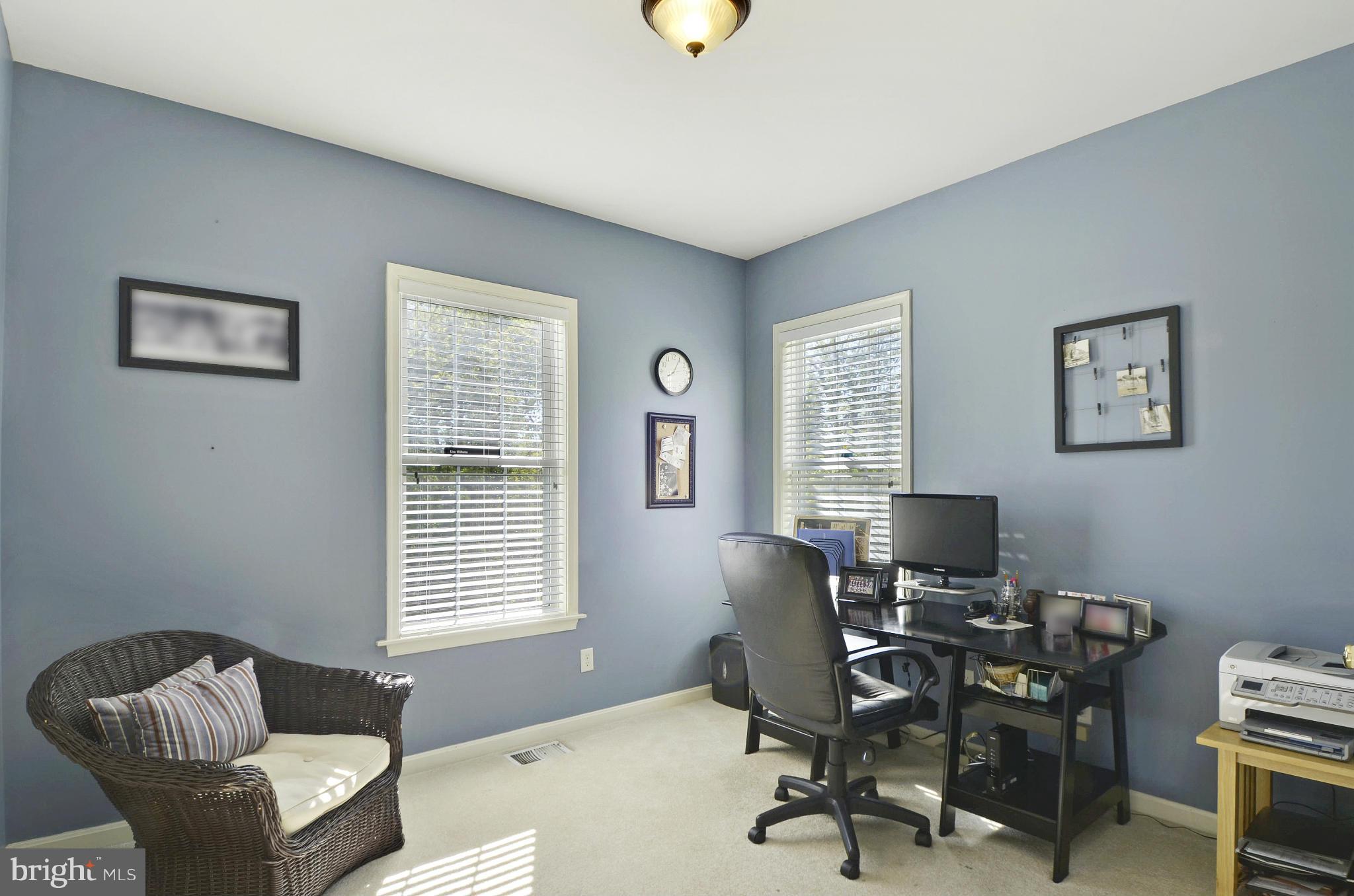 1212 Walker Road Freeland, MD 21053 - Photo 11 of 30 a view of a livingroom with workspace and a couch