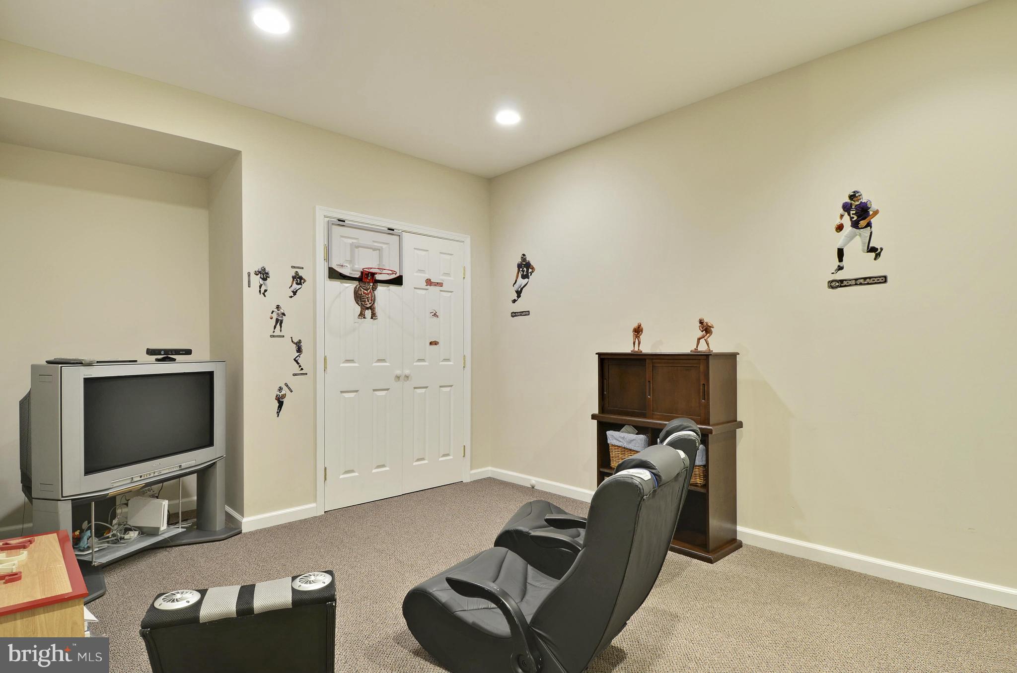 1212 Walker Road Freeland, MD 21053 - Photo 21 of 30 a living room with furniture and a flat screen tv