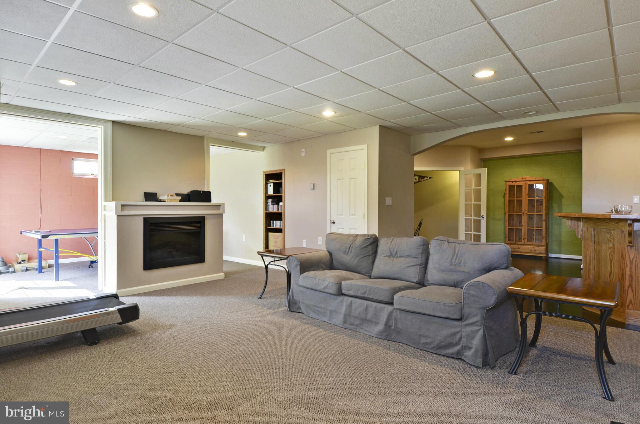 1212 Walker Road Freeland, MD 21053 - Photo 23 of 30 a living room with furniture and a fireplace