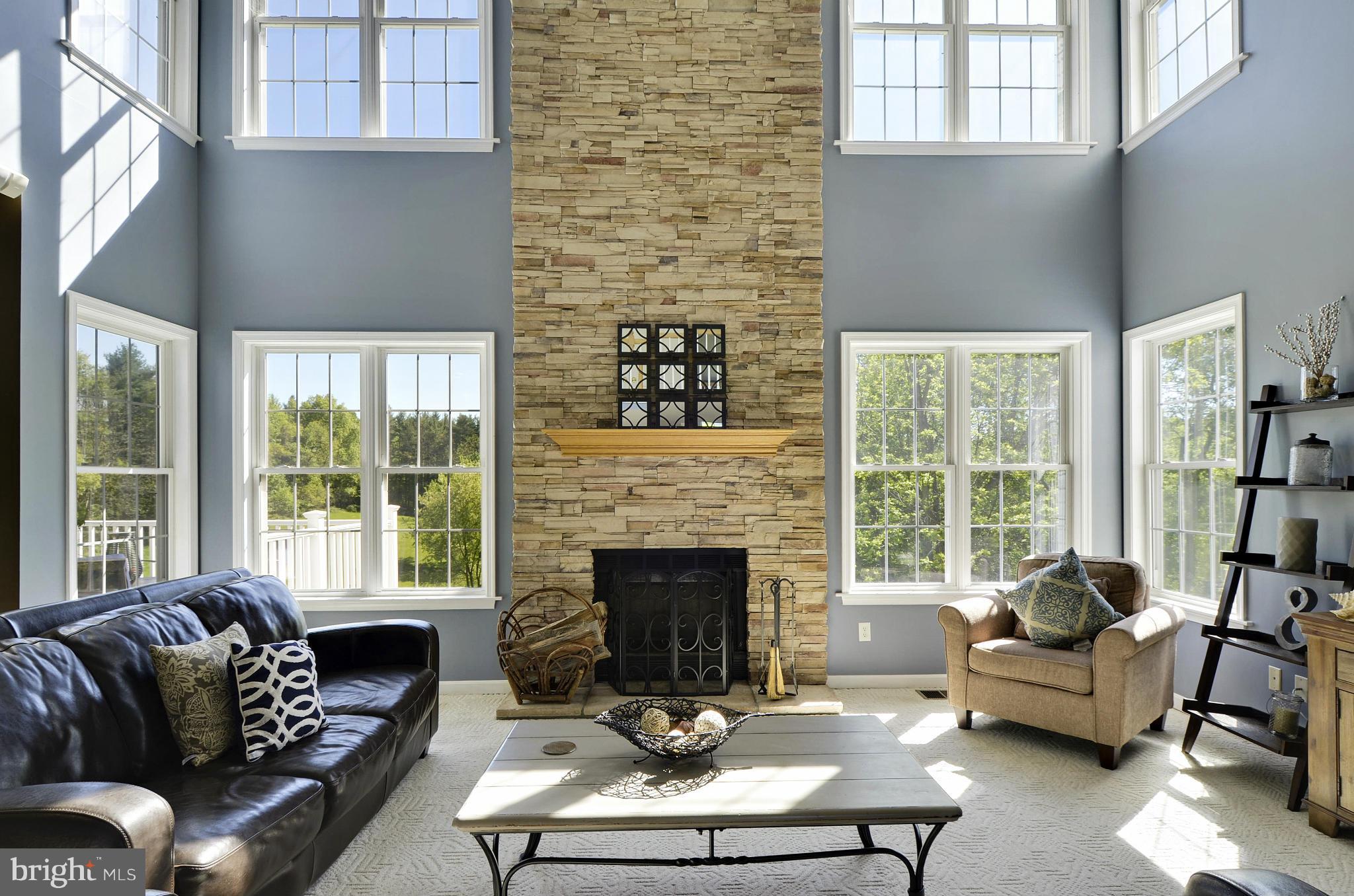 1212 Walker Road Freeland, MD 21053 - Photo 4 of 30 a living room with furniture fireplace and a large window
