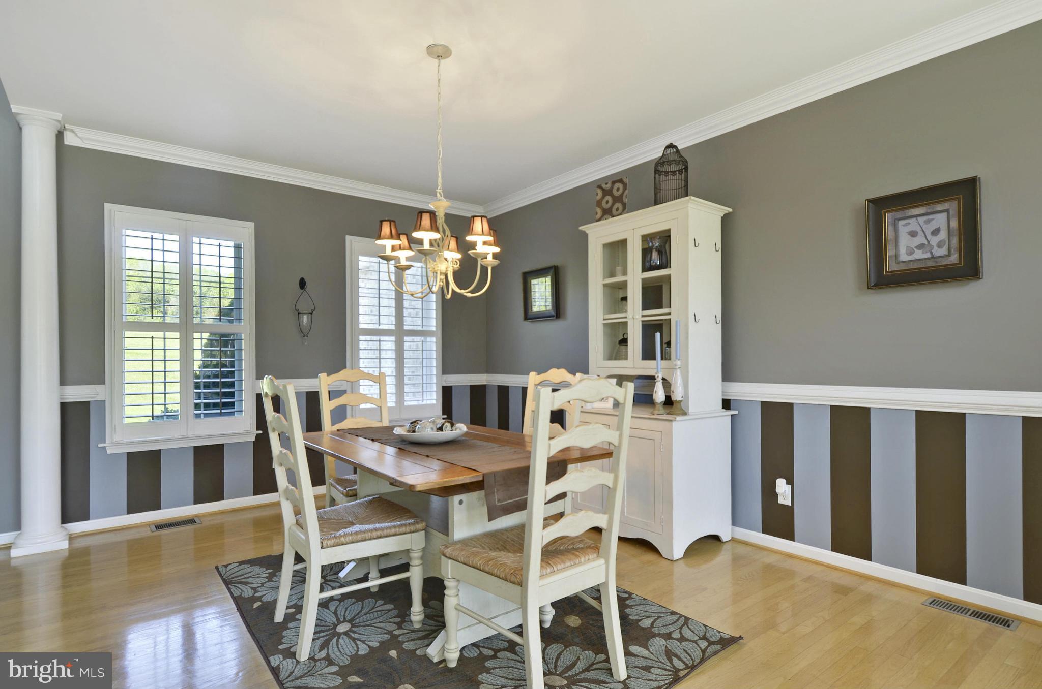 1212 Walker Road Freeland, MD 21053 - Photo 8 of 30 a view of a dining room with furniture wooden floor and chandelier