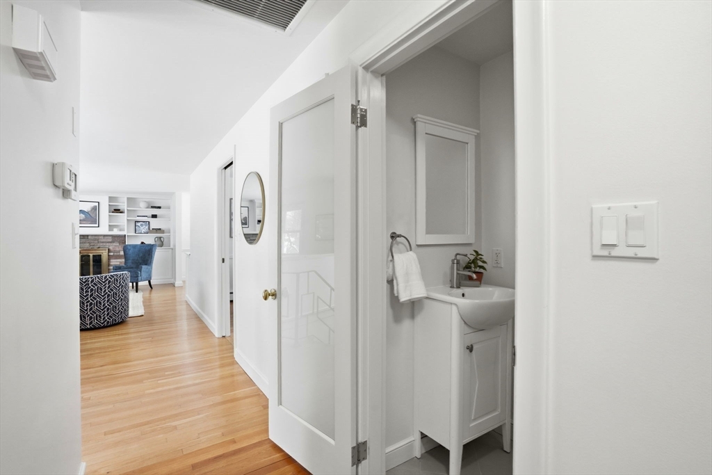 7 Baskin Road Lexington, MA 02421 - Photo 11 of 23 a view of a kitchen from the hallway