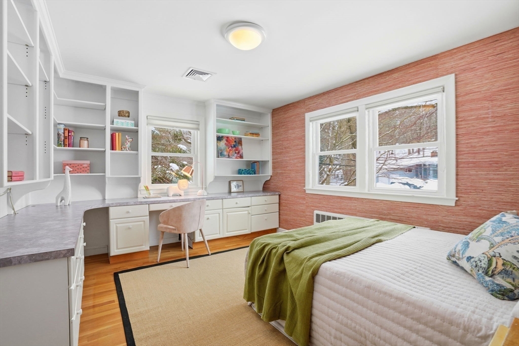 7 Baskin Road Lexington, MA 02421 - Photo 15 of 23 a bedroom with a bed and window