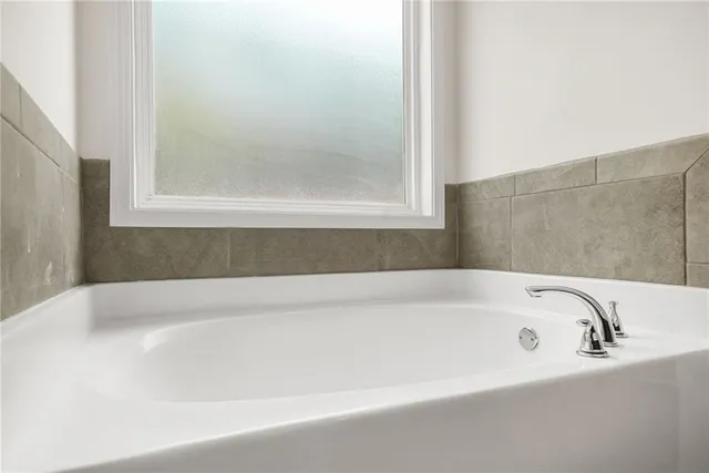 a bathroom with a bathtub