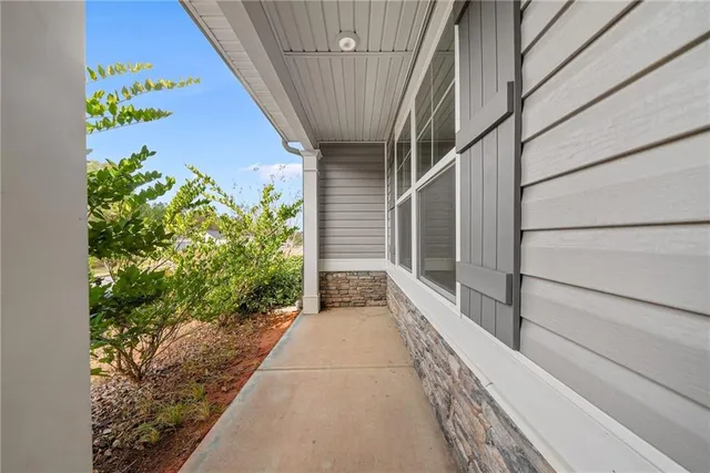 a view of a pathway of a house with an outdoor space