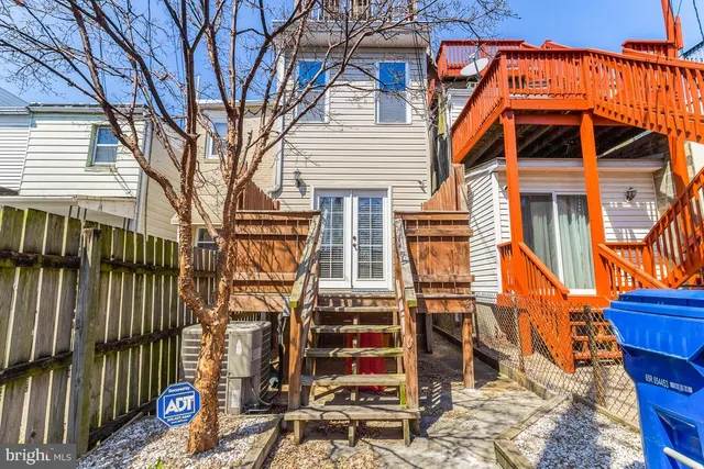 front view of a house with a street