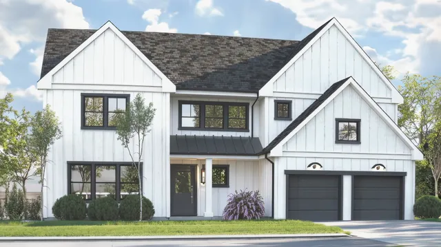 a view of a white house with large windows and a yard with plants