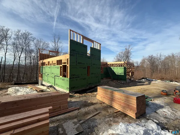 a view of a street with houses