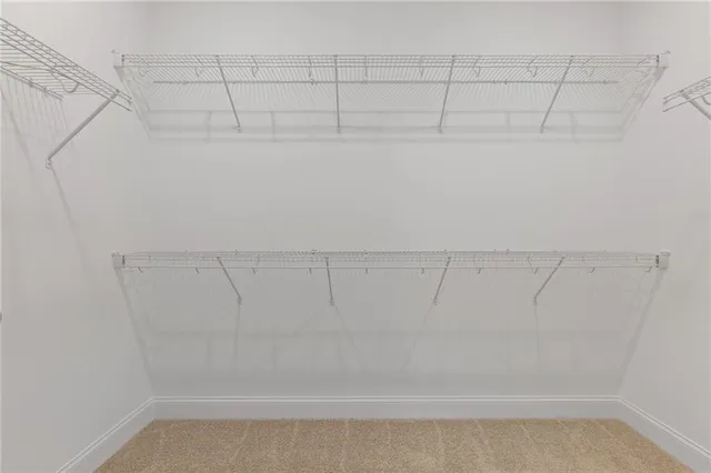 a view of a room with racks on the wall