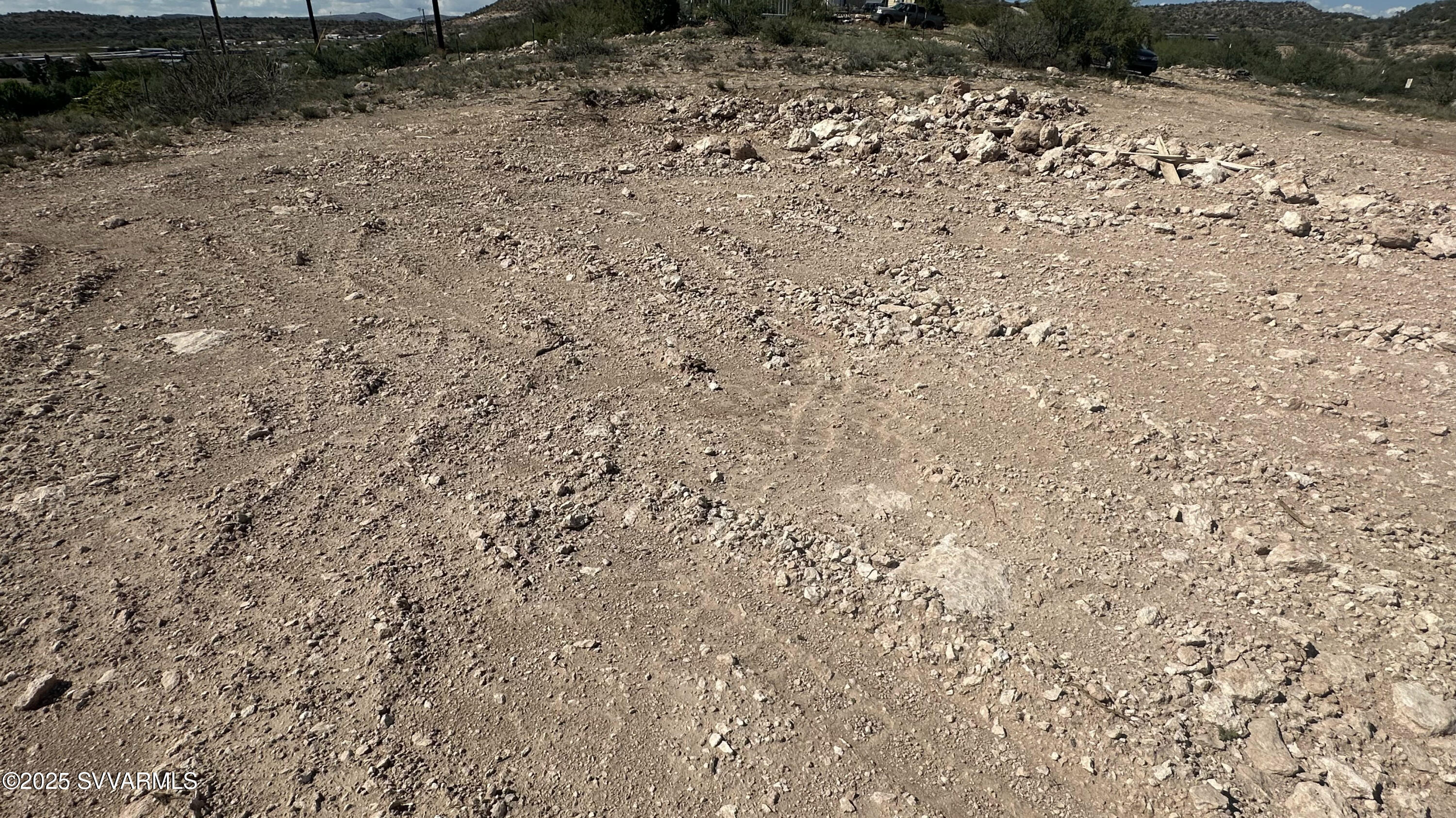 0 East Outlaw Way Rimrock, AZ 86335 - Photo 21 of 69 a view of a dry yard with trees and bushes