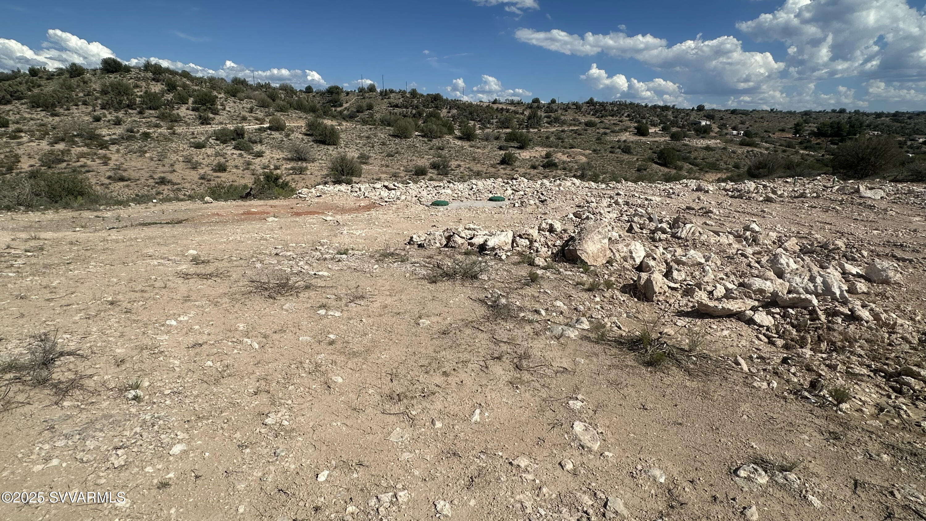 0 East Outlaw Way Rimrock, AZ 86335 - Photo 27 of 69 a view of a dry yard covered with snow