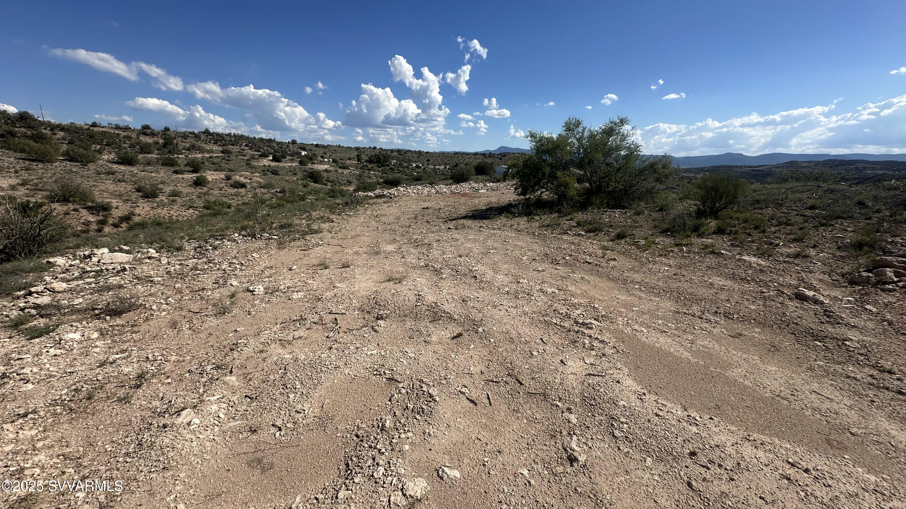 0 East Outlaw Way Rimrock, AZ 86335 - Photo 4 of 69 a view of a fountain in middle of the yard