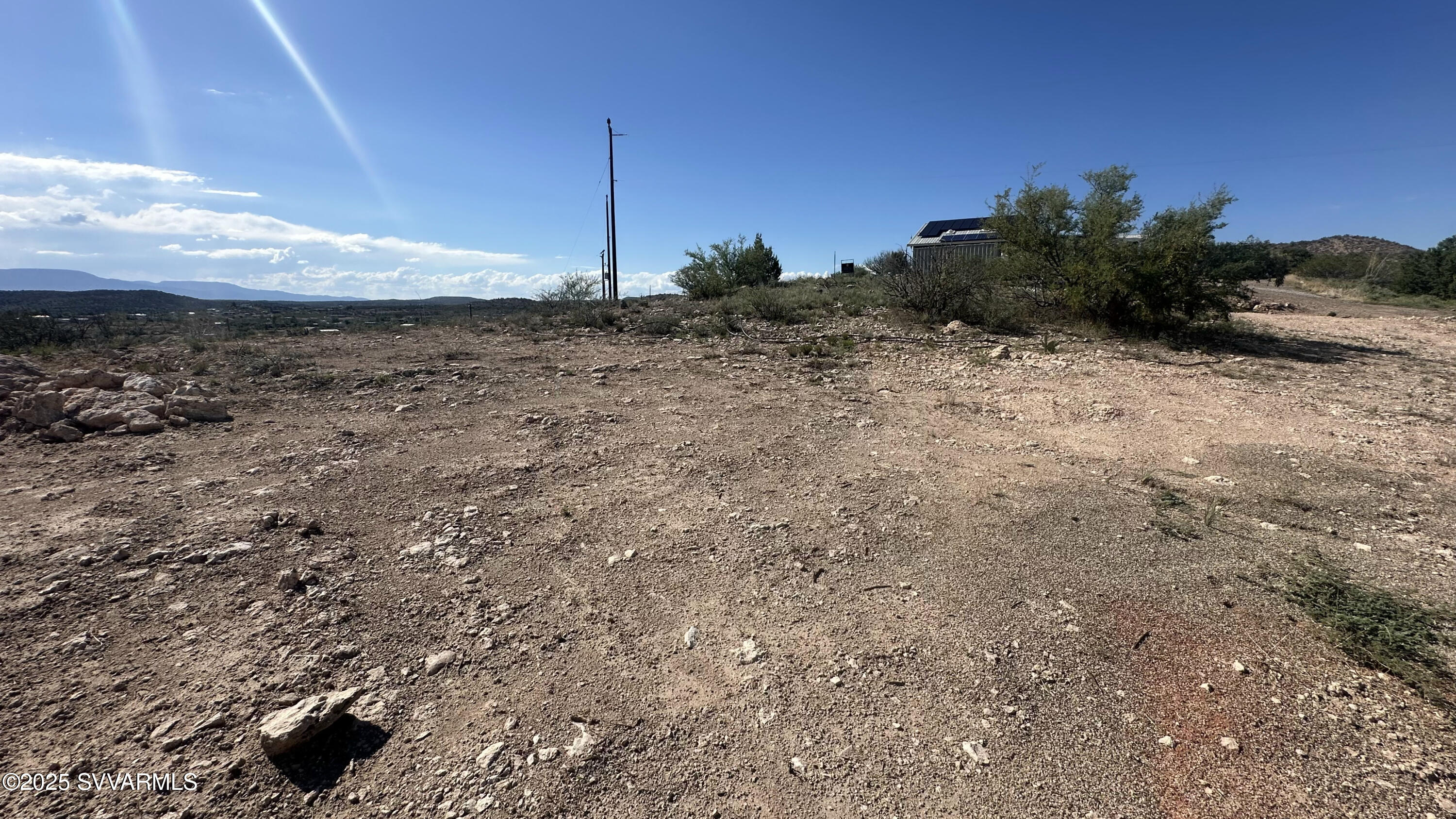 0 East Outlaw Way Rimrock, AZ 86335 - Photo 6 of 69 a view of a dry yard with trees
