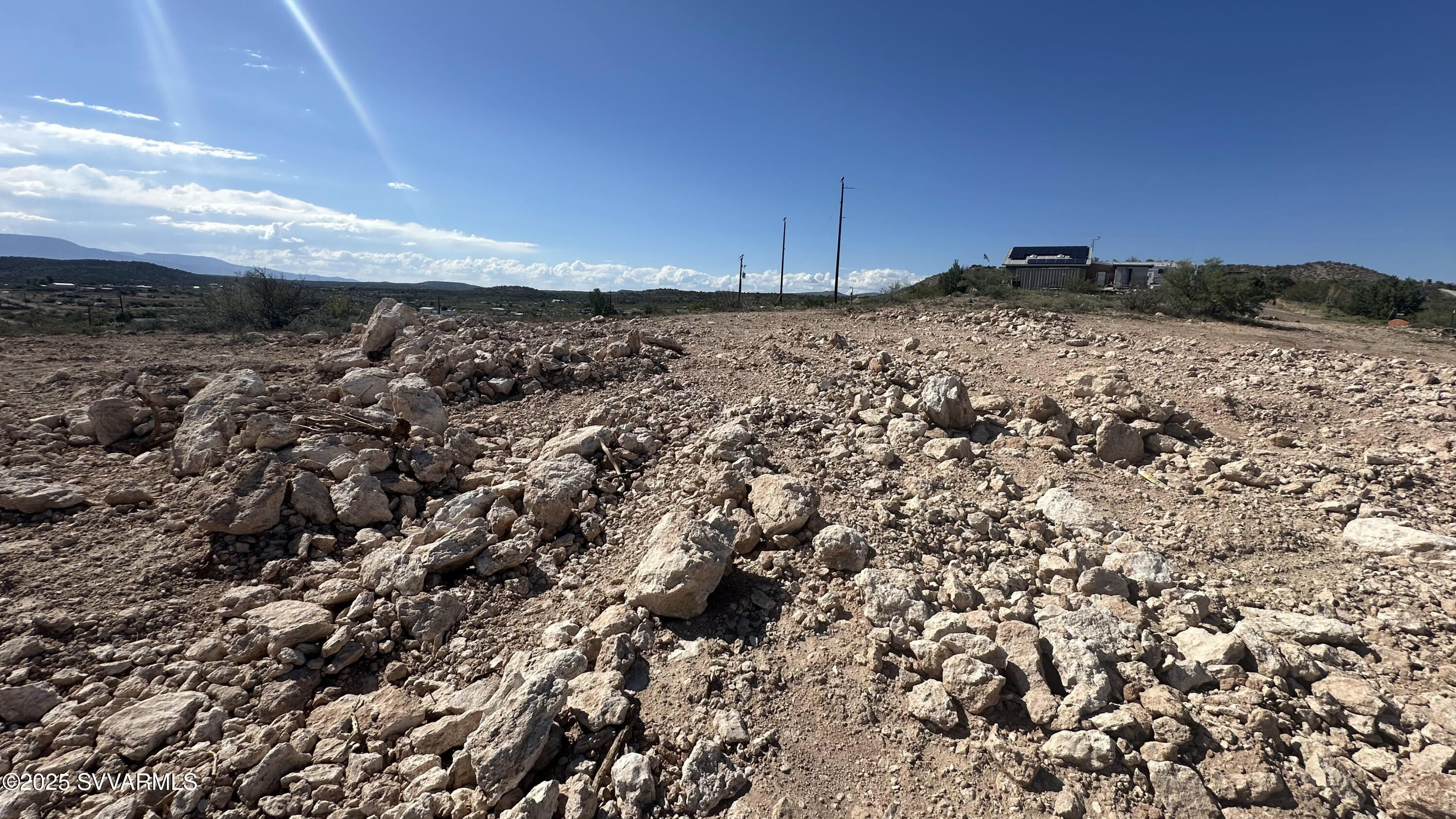 0 East Outlaw Way Rimrock, AZ 86335 - Photo 64 of 69 a view of a dry yard with wooden fence