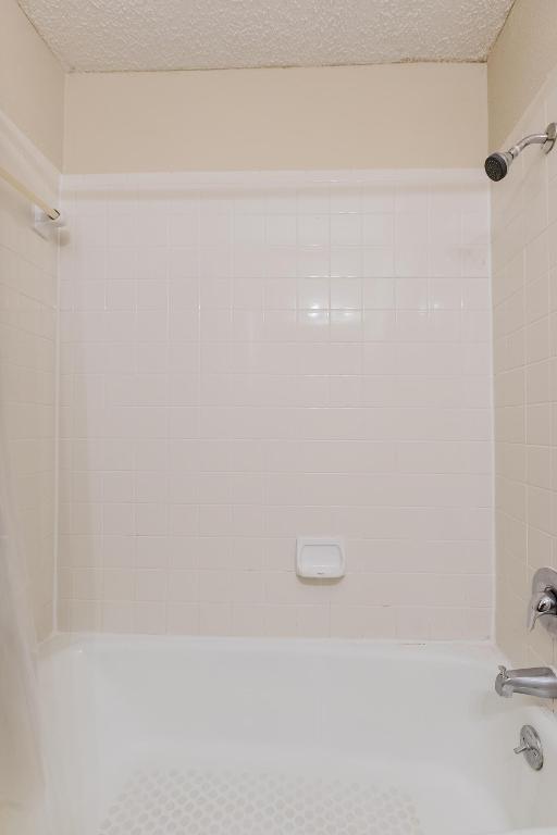 1910 Robbins Place, Unit 207 Austin, TX 78705 - Photo 21 of 28 a close up of a bathtub