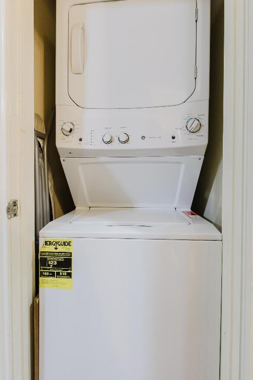 1910 Robbins Place, Unit 207 Austin, TX 78705 - Photo 23 of 28 a utility room with dryer and washer