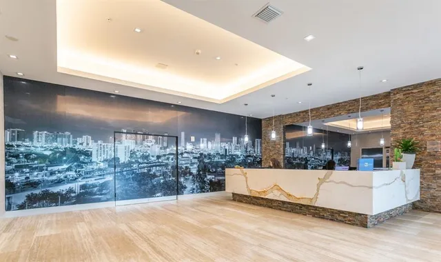 a building view with swimming pool in front of building