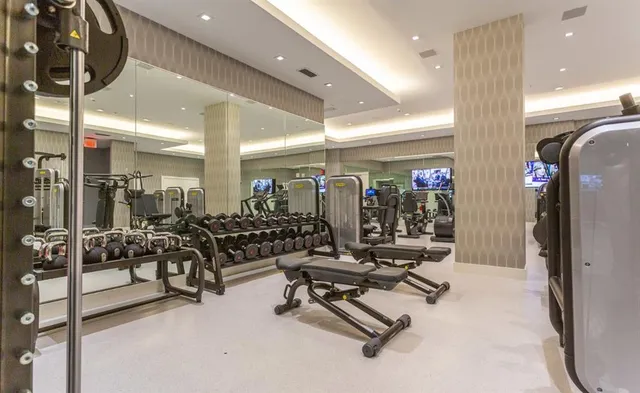 a view of a building with a swimming pool